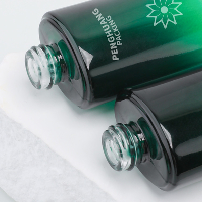 55ml de de Lotionfles van het schoonheidsglas berijpte Groene Verpakking van de Gift Vastgestelde Skincare van de Lotion de Kosmetische Fles
