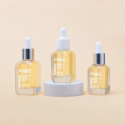 Op maat gemaakte 10ml 20ml 30ml 40ml vierkant glas serumdruppelflessen met pipet