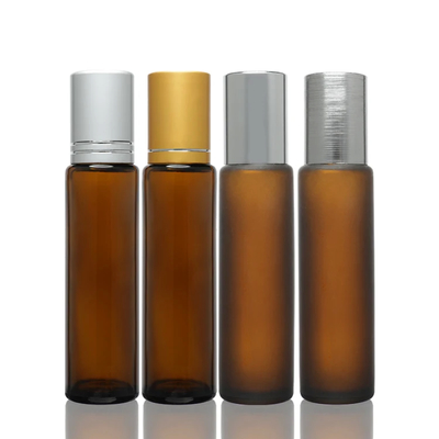 Luxe cosmetische verpakkingen Glasrol op flessen met gouden dop
