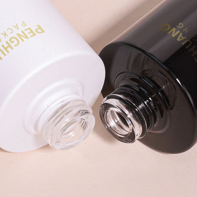 Ronde glazen druppelfles met aangepast logo volgens klantvereisten