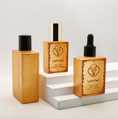 De aangepaste Kosmetische van het het Serumglas van de Olie30ml 50ml 100ml Lege gouden Vierkante Luxe Fles van het de Etherische oliedruppelbuisje