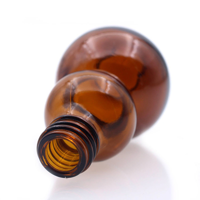 Gevormde Pompoen van de de Flessen de Amberkleur van de glasetherische olie