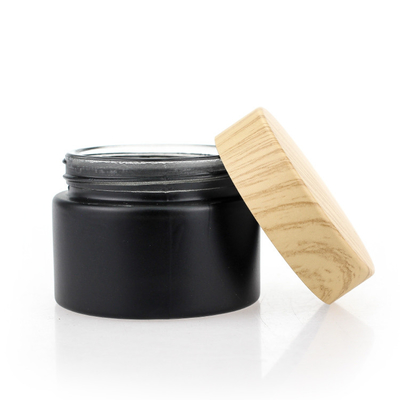 Het kosmetische Verpakkende Vastgestelde Schroefdeksel Zwart Matte Glass Jars 50g van de Bamboekleur